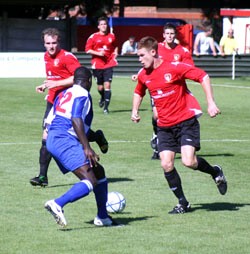 Simon Martin takes on  Jomo Faal-Thomas